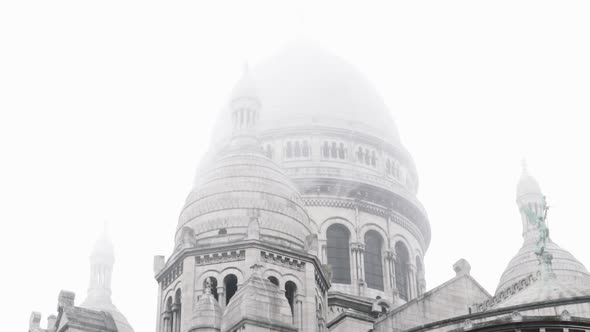 Old cathedral building in fog