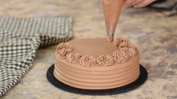 Baker Decorated Chocolate Cake With Cream