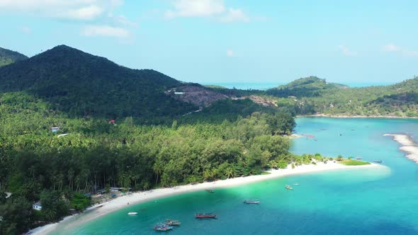 Aerial drone shot scenery of luxury bay beach journey by shallow lagoon with white sand background o