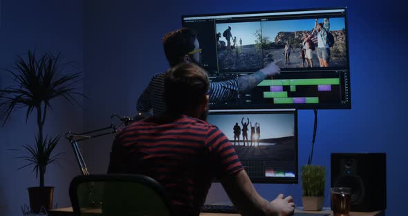 Young Man Editing Video Inside the Room