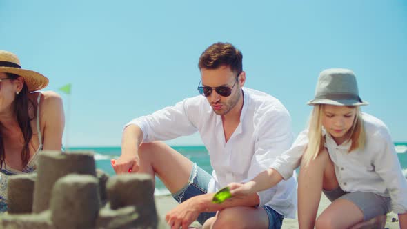 Family enjoying time together on beach