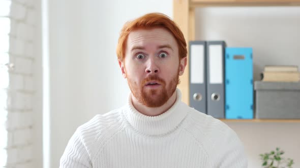 Frustrated Angry Man with Red Hairs  Yelling, Sitting in Office