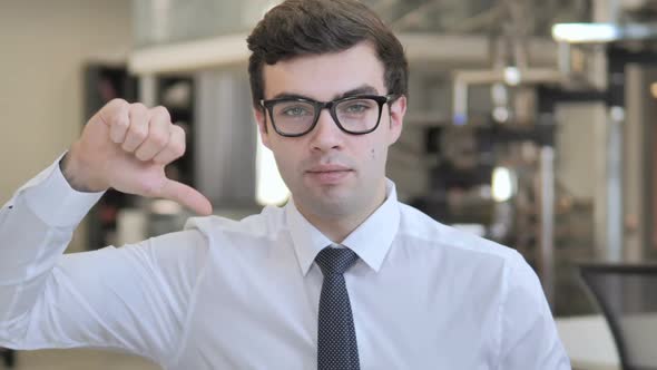 Thumbs Down By Businessman