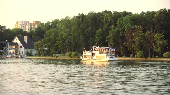Belarus Minsk  28 July 2021 Tourist Cruise Liner Rolls Tourists Along the Svisloch River Near Minsk