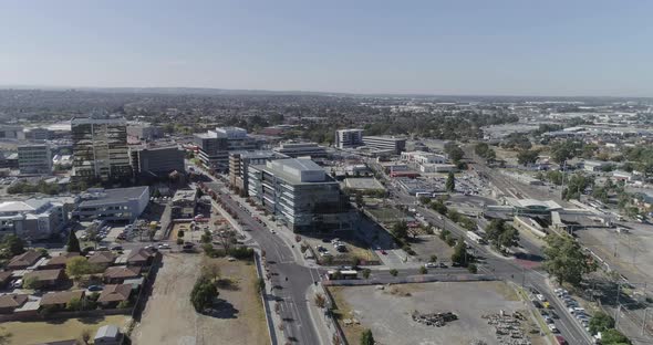 Aerial approach on Dandenong city showing modern developments with lots of areas to expand over the