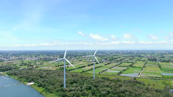 The wind turbine is located by the sea