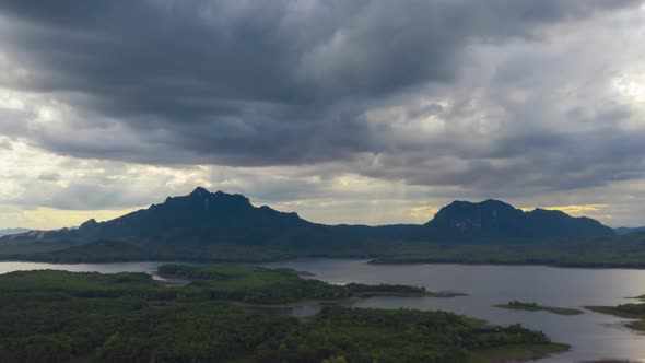 Aerial view rain storms and black clouds moving over the mountains.