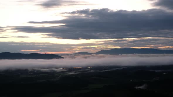 Landscape of sunrise sky and the sea of fog in the morning