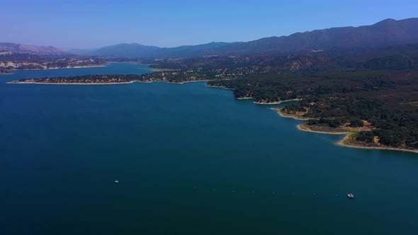 Rotating drone shot of Lake Cachuma and the mountains near Santa Barbara Ca.