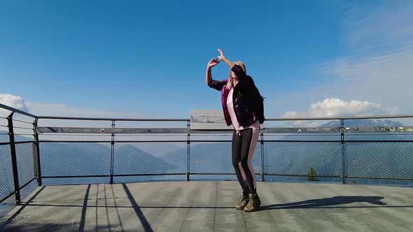 Woman Jumps on Aussichtsplattform Cardada Platform