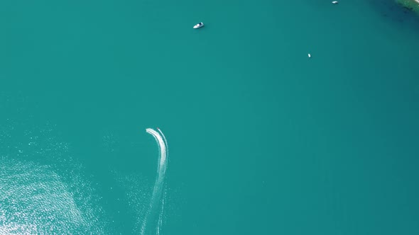 Aerial View From Above on Calm Azure Sea and Volcanic Rocky Shores