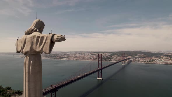Outstretched arms Cristo Rei, Catholic monument, overlooking Lisbon city