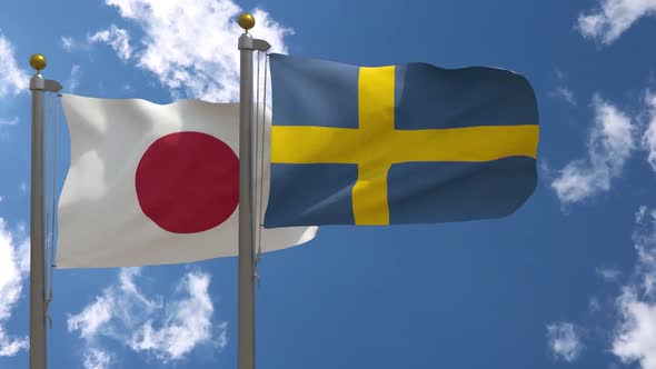 Japan Flag Vs Sweden Flag On Flagpole