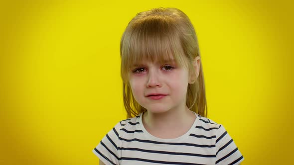 Disappointed Upset Kid Child Girl with Tears on Eyes Cries From Despair Sad Because of Unfair Things