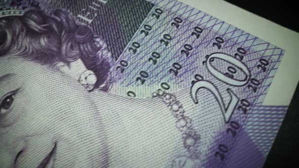 Fifty British Pound Paper Banknote in Close Up Macro View Dolly Shot