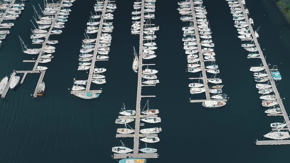 Top Down Yachts at Pier Slow Motion Aerial