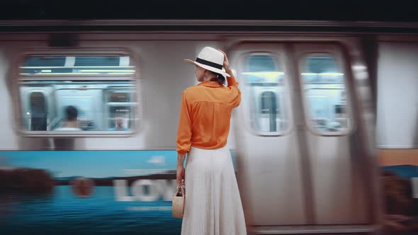 Young girl in a subway station