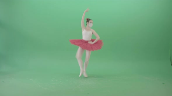 Ballet Girl In Corona Virus Mask Jumping Like Ballerina Isolated On Green Screen