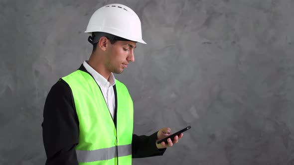 Arabic Engineer Man with a Phone