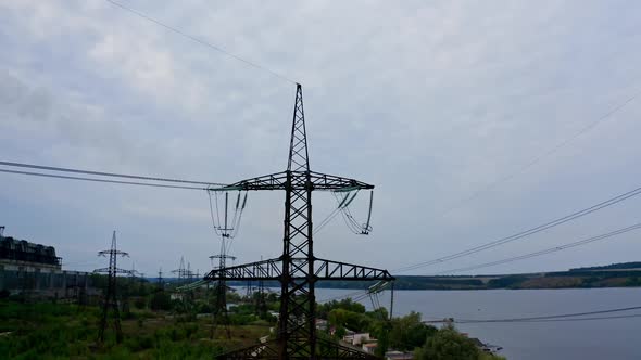 Electric poles under blue sky. High voltage transmission towers for supplying electricity