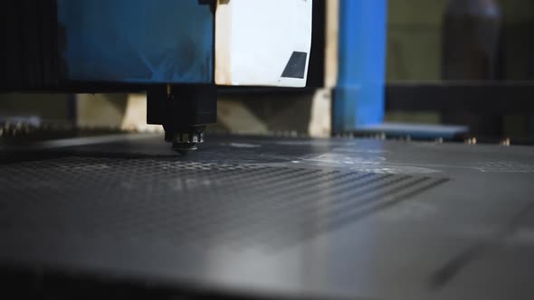 The Machine for Laser Cutting of Metal Makes the Cutting of a Metal Sheet.