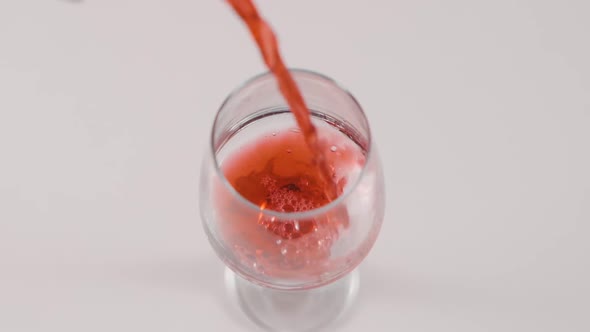 Cherry juice in a glass.