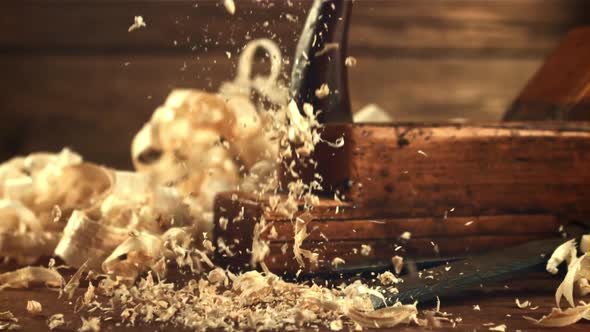 Wooden Shavings Fall on the Table