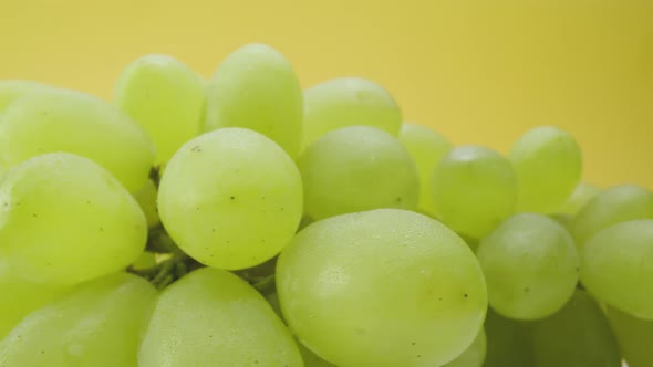 Fresh green grapes on table