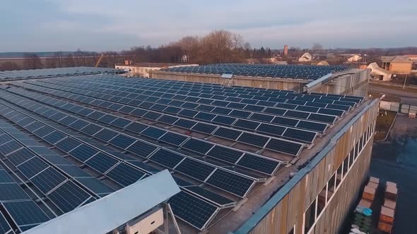 New solar station on the roof at sunset.