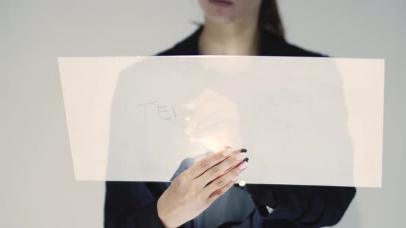 Corporate Woman Writing Teamwork On A Board