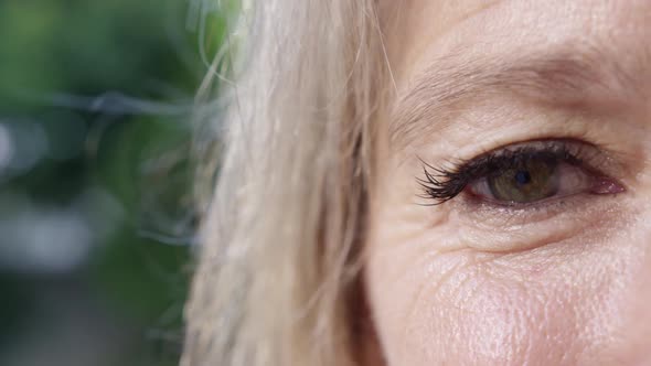 Eye of a smiling woman