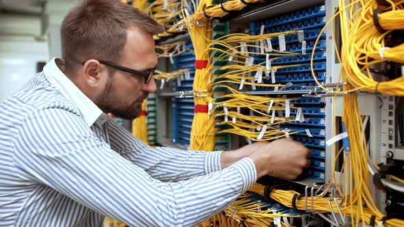 Engineer Working in Data Room