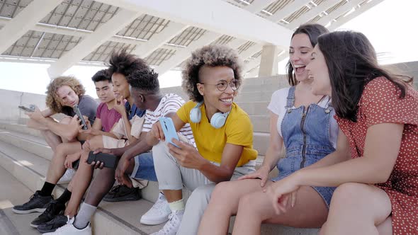 Group of Young Mixed Race People with Mobile Phones