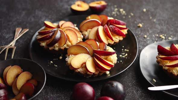 Delicious Homemade Mini Tarts with Fresh Sliced Plum Fruit