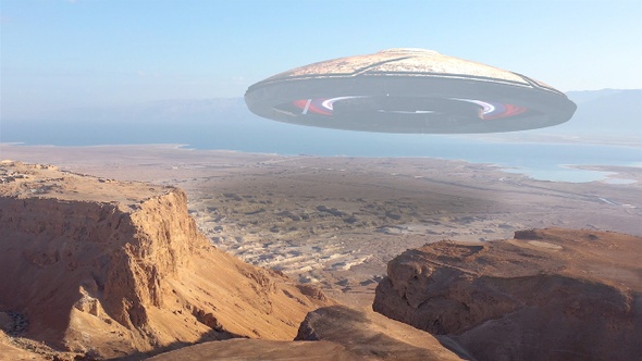 Alien Ufo Hovering Over Desert Mountains And Sea