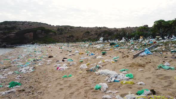 Environmental disaster on polluted beach - human irresponsibility; aerial