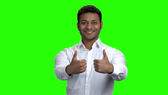 Successful Indian Businessman Gesturing Thumbs Up