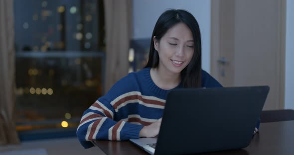 Woman work on computer at home