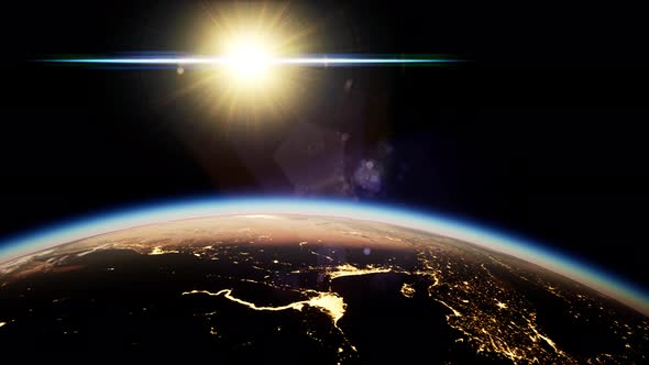 Space, Sun and Planet Earth at Night alt