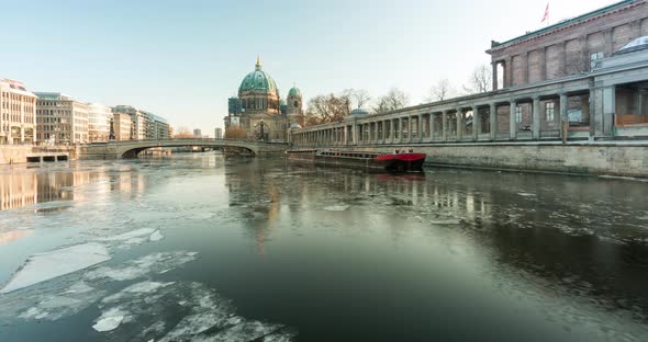 Time lapse of spree river and Berlin dome with ice floes