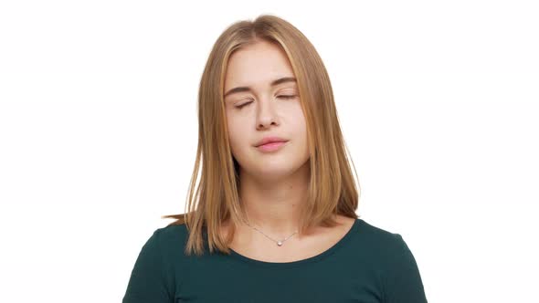 Portrait of Caucasian Woman Looking on Camera Apathetically Rolling Her Hazel Eyes Being Sick of