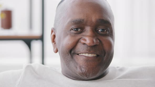 Portrait of Happy Male Face with Dark Wrinkled Skin Closeup Emotional African American Black Ethnic