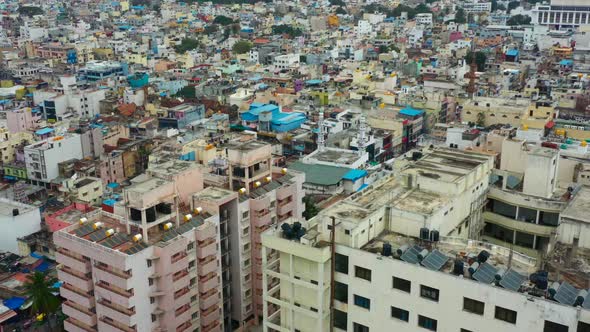 Aerial upwards rotating view of urban community in Bangalore India