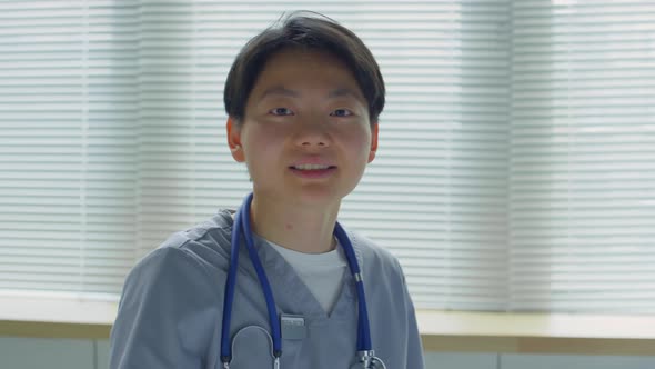 Portrait of Young Asian Female Doctor in Clinic