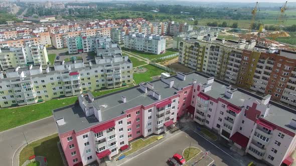 construction of modern high-rise buildings near the new buildings in the city. Aerial view