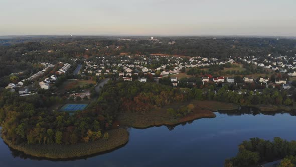 Aerial View of Town Along the River with Residential Areas of Private Houses Bench in Autumn