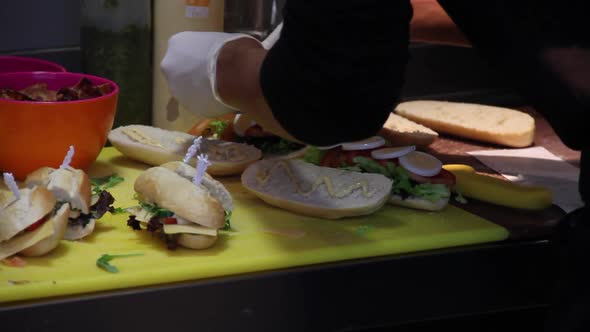 Caterer making sandwiches