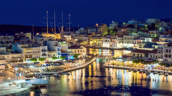 The Lake Voulismeni and Agios Nikolaos Town at Night on the Island Crete, Greece