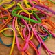 Colorful Rubber Bands on the Wooden Floor - VideoHive Item for Sale
