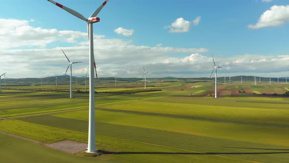 Aerial View of Wind Turbines Farm in Field. Austria. Drone View on Energy Production